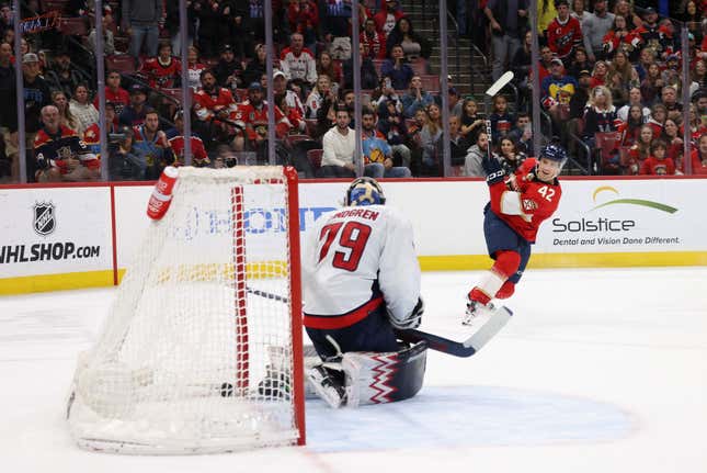 SUNRISE, FLORIDA - FEBRUARY 24: Gustav Forsling #42 of the Florida Panthers scores the game-winning goal in overtime against Charlie Lindgren #79 of the Washington Capitals at Amerant Bank Arena on February 24, 2024 in Sunrise, Florida. The Panthers defeated the Capitals 3-2 in overtime. (Photo by Bruce Bennett/Getty Images)