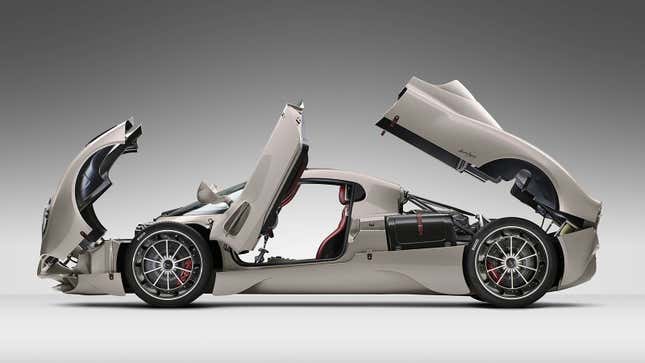 A photo of a Pagani Utopia with its doors, hood and trunk open.