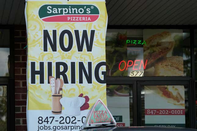 A hiring sign is displayed at a restaurant in Palatine, Ill., Wednesday, Sept. 13, 2023. On Thursday, the Labor Department reports on the number of people who applied for unemployment benefits last week. (AP Photo/Nam Y. Huh)