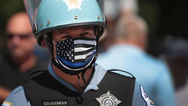 File photo of Chicago police officers standing guard at a “Blue Lives Matter” protest on July 25, 2020 in Chicago, Illinois. 