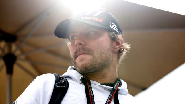 A photo of Valtteri Bottas in the formula 1 paddock. 