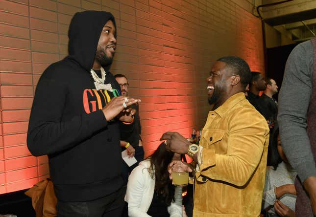 ATLANTA, GA - FEBRUARY 02: Meek Mill (L) and Kevin Hart attend Fanatics Super Bowl Party at College Football Hall of Fame on January 5, 2019 in Atlanta, Georgia. 