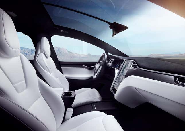 The Tesla Model X's giant windshield stretches from the hood back to the B-pillar