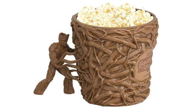 A popcorn bucket that looks like it's made out of tendrils of wood grows out of the arms of Groot.