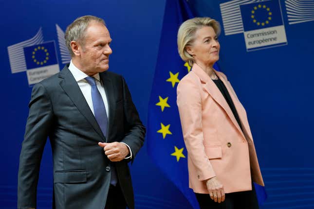 Leader of the Polish Civic Coalition Donald Tusk, left, and European Commission President Ursula von der Leyen walk off the podium after addressing a media conference at EU headquarters in Brussels, Wednesday, Oct. 25, 2023. (AP Photo/Virginia Mayo)