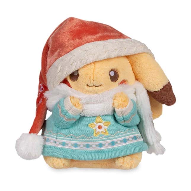 Pikachu con un gorro de Papá Noel, un suéter azul con un Staryu, una bufanda blanca y simplemente siendo un pequeño hombre.