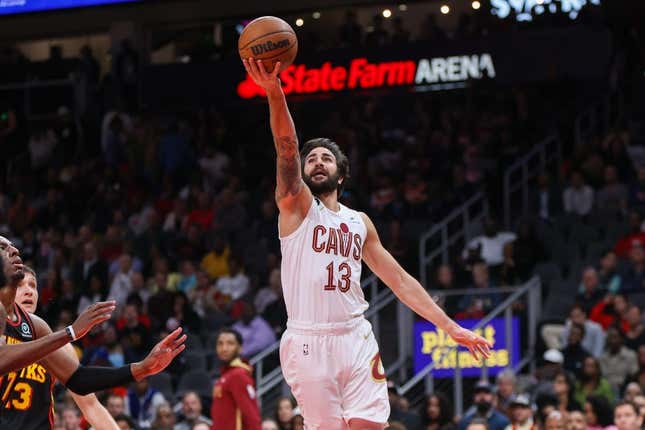 Mar 28, 2023; Atlanta, Georgia, USA; Cleveland Cavaliers guard Ricky Rubio (13) shoots against the Atlanta Hawks in the second quarter at State Farm Arena.