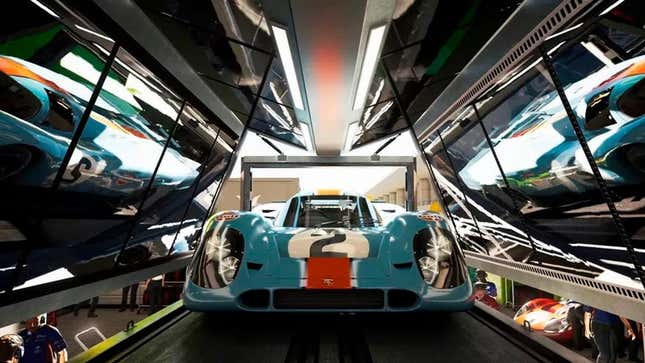 There is a racing car parked in the showroom. 