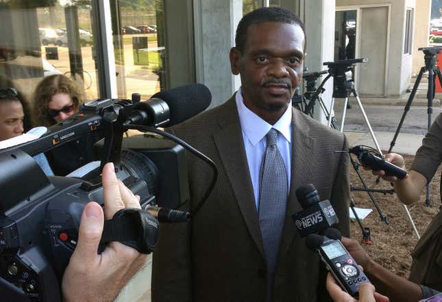 Henry McCollum walks out of prison after being released from Central Prison in Raleigh, N.C. 