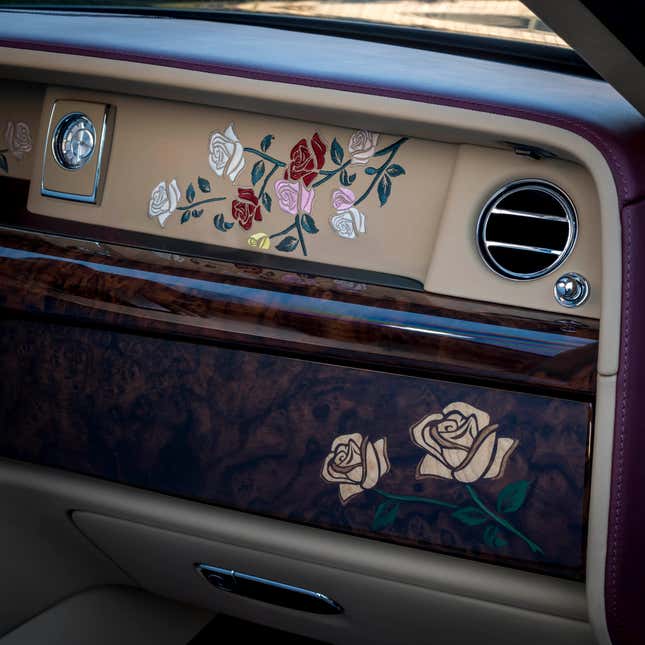 Detail of the rose artwork on a Rolls-Royce Phantom dashboard
