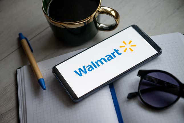 A Walmart logo on a smartphone. 