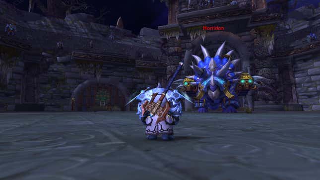 A player character faces a monster.