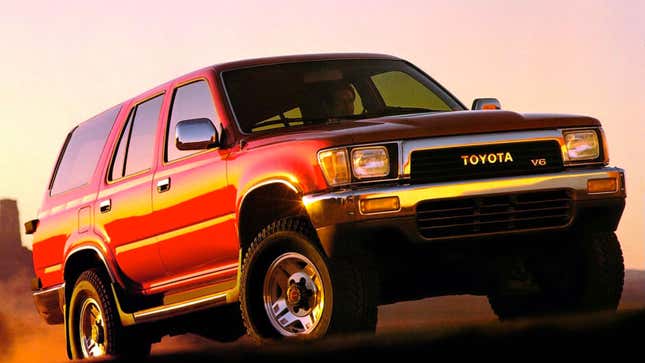 A photo of a red Toyota 4Runner truck. 