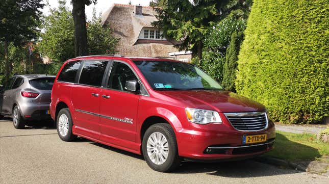 A red 2013 Chrysler Town & Country