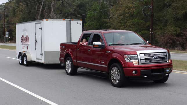 A red Ford F-150 at 2014 Lake Park Christmas Parade, Lake Park, Lowndes County, Georgia