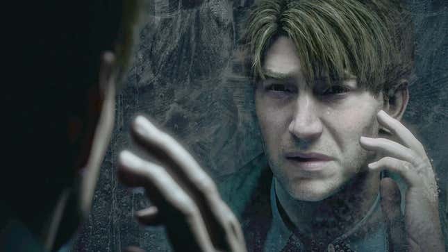 Silent Hill 2's James Sunderland looks in the mirror.