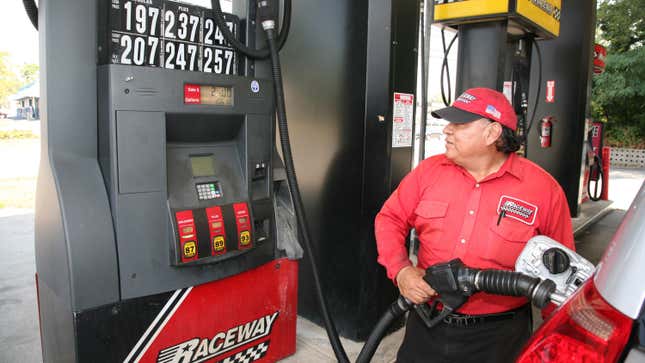 A photo of someone pumping fuel. 