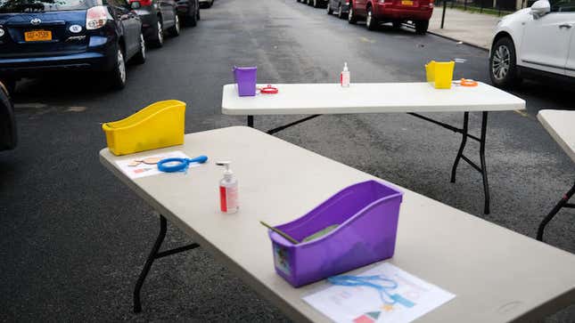 Tables were set up for students in the street at the outdoor learning demonstration in New York City.