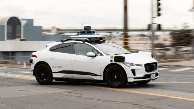 A Waymo autonomous vehicle on Cesar Chavez Street in San Francisco, on November 17, 2023.