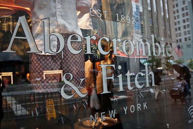 FILE - In this May 22, 2017, file photo, a store window reflects a street scene at an Abercrombie &amp; Fitch store on New York&#39;s Fifth Avenue. A former model for Abercrombie &amp; Fitch has sued the fashion retailer, Friday, Oct. 27, 2023, alleging it allowed its former CEO Mike Jeffries to run a sex-trafficking organization during his 22-year tenure.(AP Photo/Bebeto Matthews, File)