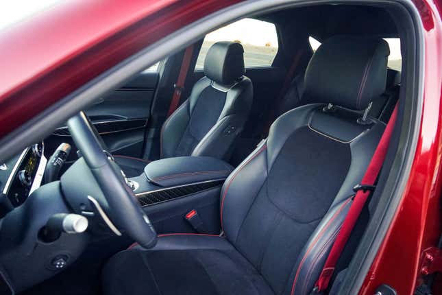 A blue-with-red-stitching GV70 interior.