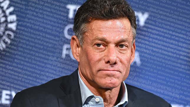 An image shows Zelnick in front of thousands of words. 