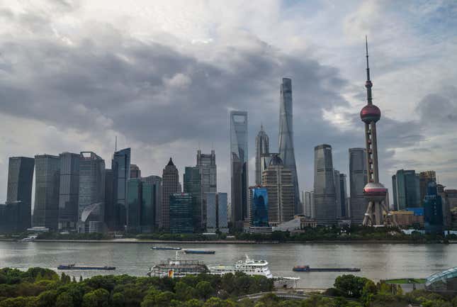 The Huangpu River and Shanghai skyline during a cloudy day