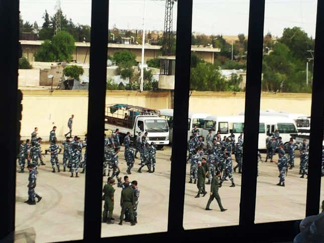 Government forces surrounded Hama on the first day of prisoner rioting.