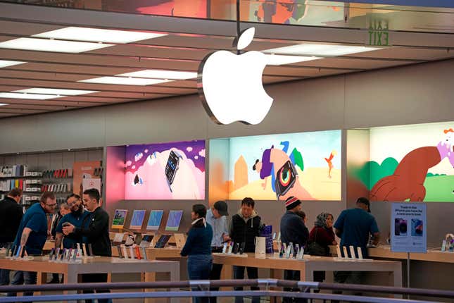 FILE - Customers shop in an Apple store in Pittsburgh Jan. 30, 2023. Apple reports earnings on Thursday, Nov. 2, 2023. (AP Photo/Gene J. Puskar, File)