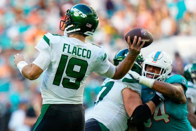 Jan 8, 2023; Miami Gardens, Florida, USA; New York Jets quarterback Joe Flacco (19) throws a pass against the New York Jets during the second half at Hard Rock Stadium.