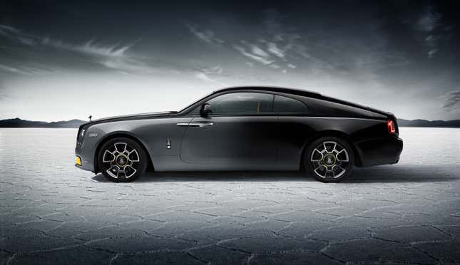 Side view of a grey and black Rolls-Royce Wraith