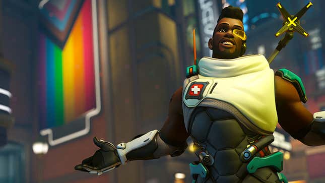 Overwatch hero Baptiste gesturing in front of a Pride flag.