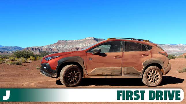 A photo of a Subaru Crosstrek Wilderness hatch in orange. 