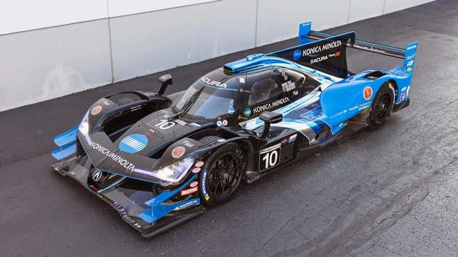 A front three-quarters photo of the black, blue and silver Acura ARX-05 prototype