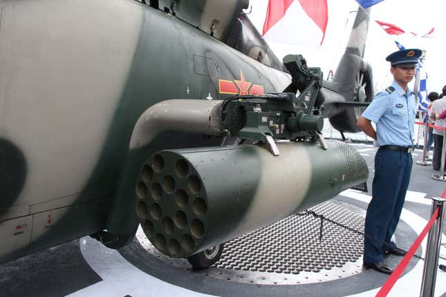 PLA helicopters and other machinery were on display.