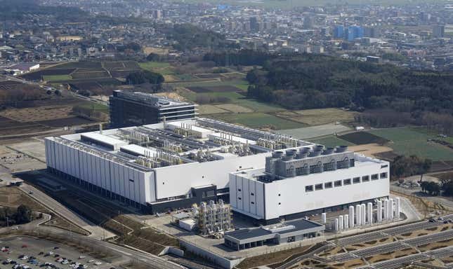 This photo shows a newly built plant for Taiwan Semiconductor Manufacturing Co. (TSMC) in Kikuyo town, a suburb of Kumamoto, southwestern Japan, Feb. 12, 2024. TSMC opened Saturday, Feb. 24, in an official ceremony its first semiconductor plant in Japan as part of its ongoing global expansion. Japan Advanced Semiconductor Manufacturing (JASM), a subsidiary of TSMC, will run the plant. (Kyodo News via AP)