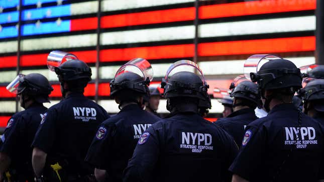 NYPD police officers watch demonstrators in Times Square on June 1, 2020, during a “Black Lives Matter” protest. 
