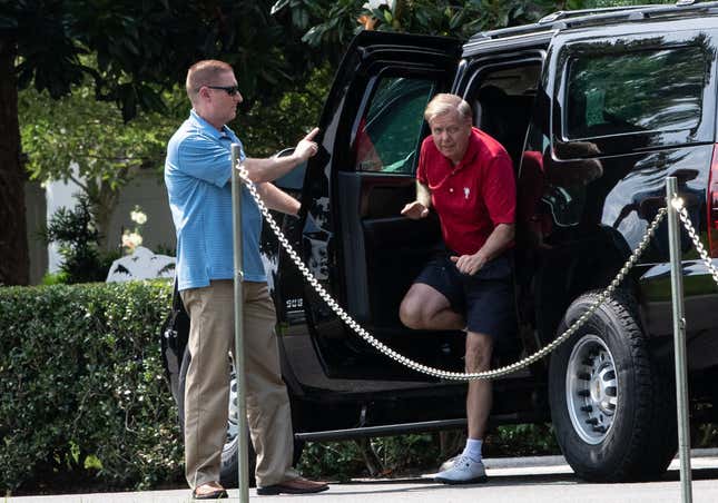 Republican Senator Lindsey Graham gets out of an SUV at the White House in Washington, D.C, on June 16, 2019, after golfing with President Donald Trump at his Trump National Golf Club in Virginia.