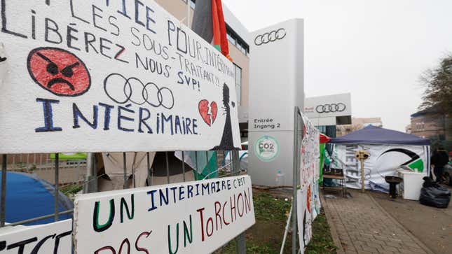 A photo of signs outside an Audi plant in Belgium. 