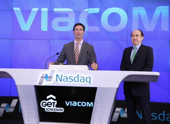 (L) Brian Niccol, during his tenure as Taco Bell’s CEO, and (R) Philippe Dauman, CEO of Viacom, ring the NASDAQ Opening Bell on June 10, 2015 in New York City. 