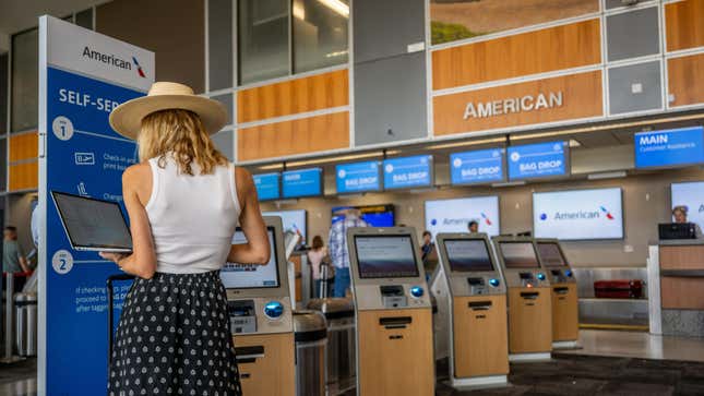 A woman checking in at the Austin-Bergstrom International Airport