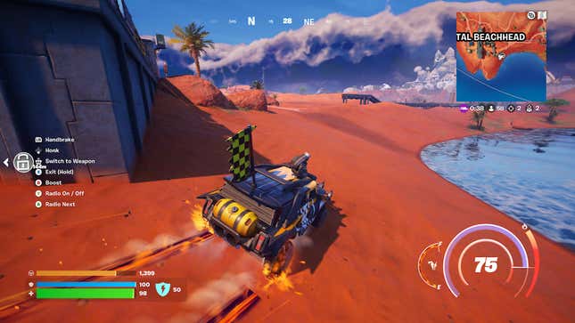 The player character races across the sand in a car.