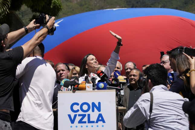 Opposition coalition presidential hopeful Maria Corina Machado gives a press conference outside her campaign headquarters in Caracas, Venezuela, Monday, Jan. 29, 2024, days after the country&#39;s highest court upheld a ban on her presidential candidacy. (AP Photo/Ariana Cubillos)