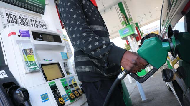  A person prepares to pump gas at a BP gas station on Coney Island Avenue on October 19, 2022 in the Flatbush neighborhood of Brooklyn borough in New York City.