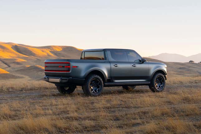 Rear 3/4 view of a grey Scout Terra pickup