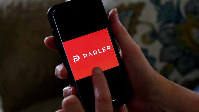 This illustration picture shows social media application logo from Parler displayed on a smartphone in Arlington, Virginia on July 2, 2020