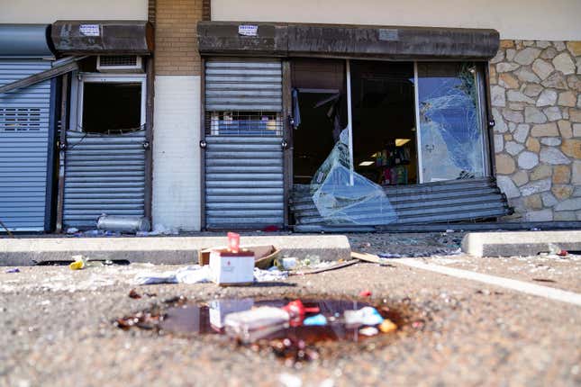 Shown is the aftermath of ransacked liquor store in Philadelphia, Wednesday, Sept. 27, 2023. Police say groups of teenagers swarmed into stores across Philadelphia in an apparently coordinated effort, stuffed bags with merchandise and fled. (AP Photo/Matt Rourke)