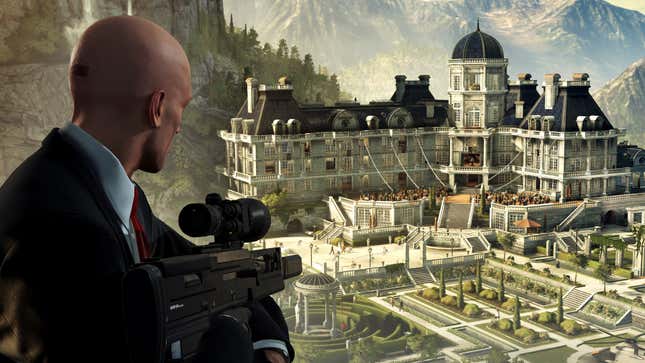 Agent 47 looks out over a mansion while holding a sniper rifle.