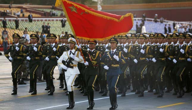 Chinese military march into position ahead of the parade.