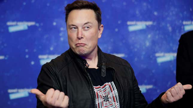 A photo shows Elon Musk giving two thumbs up before receiving the Axel Springer Award 2020 In Berlin.